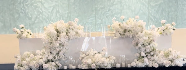 White bridal table florals